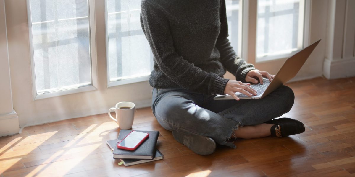 woman-in-gray-sweat-shirt-sitting-beside-window-3759080